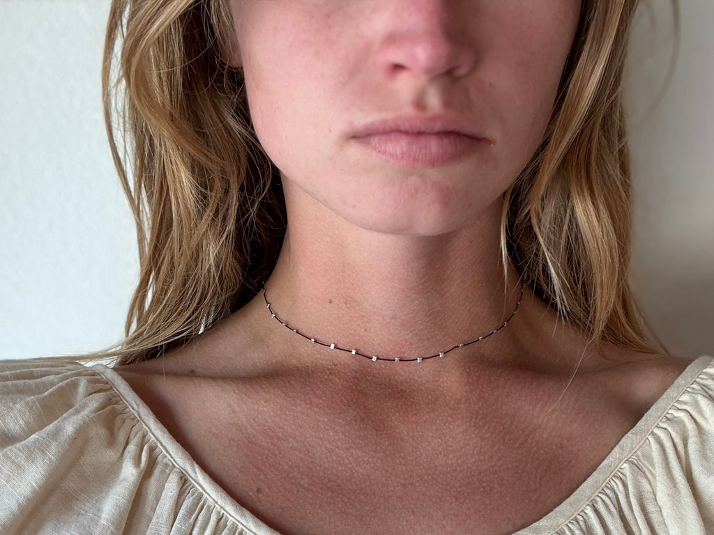sprinkle-necklace-gold-silver-beaded-silk-cord-minimalist-jewelry.webp