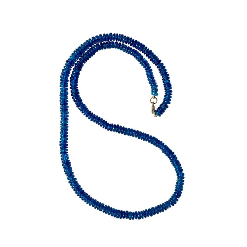 Blue beaded necklace on a white background