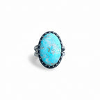 Oval Turquoise Ring with Fancy Bezel