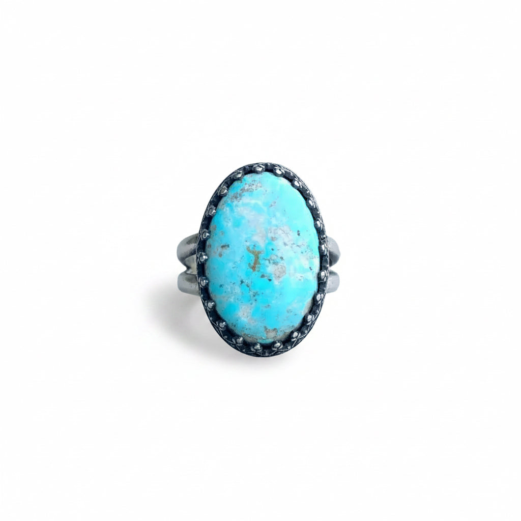 Oval Turquoise Ring with Fancy Bezel