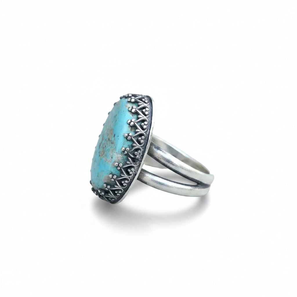 Oval Turquoise Ring with Fancy Bezel