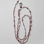 sprinkle-necklace-gold-silver-beaded-silk-cord-minimalist-jewelry.webp